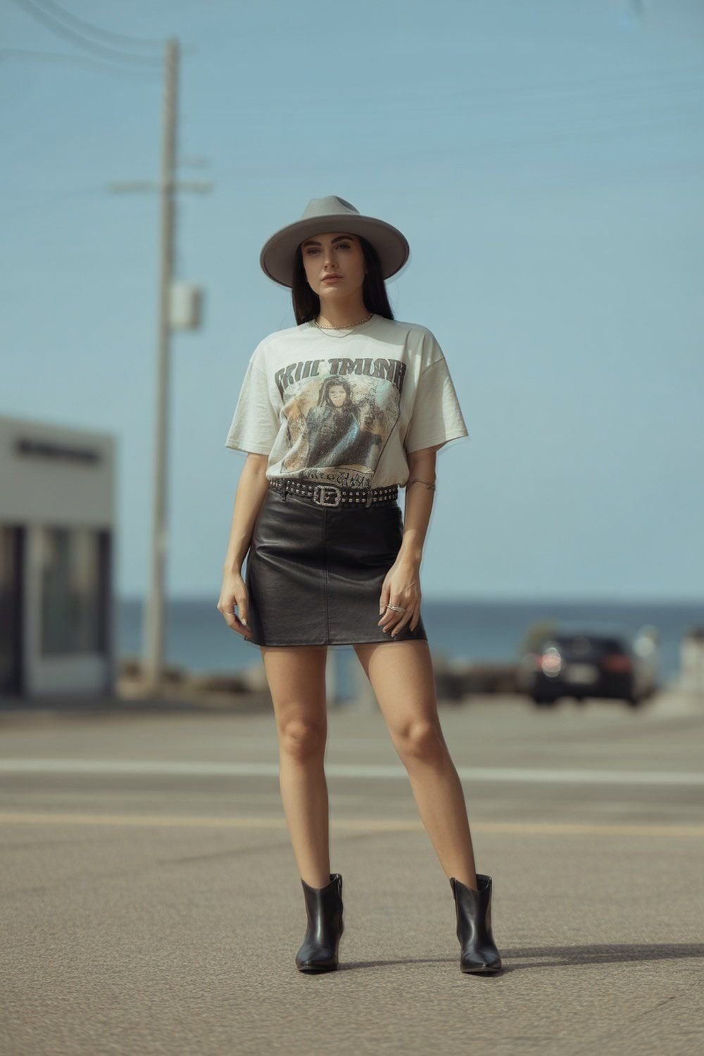 Graphic Tee with Leather Skirt and Cowboy Hat