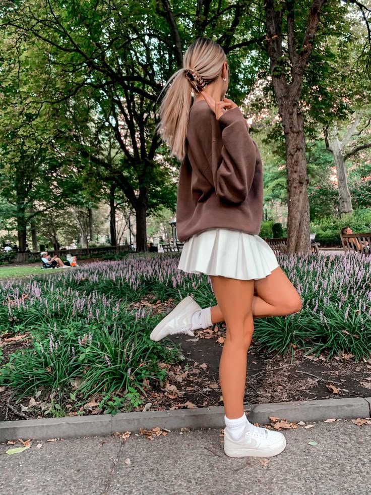 pleated skirts and crewnecks | White tennis skirt, White tennis skirt outfit, Effortlessly chic outfits pleated skirts and crewnecks | White tennis skirt, White tennis skirt outfit, Effortlessly chic outfits - skirt and sweater outfit