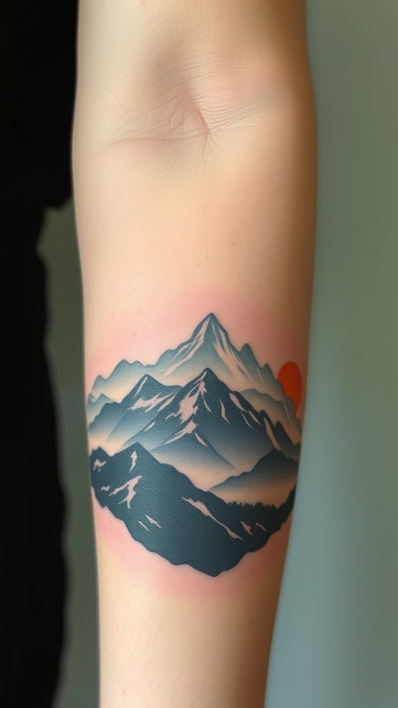 A layered mountain landscape tattoo featuring blue and red tones.